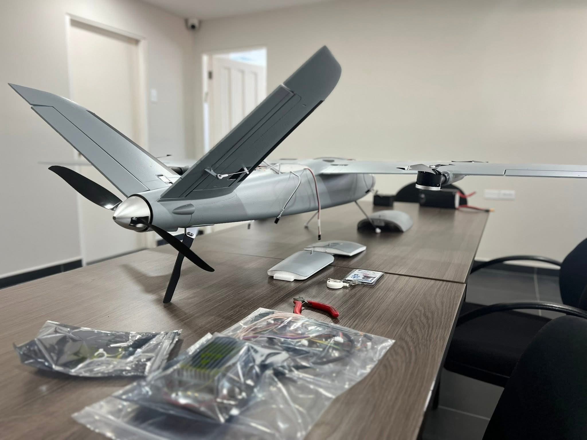 Fixed-wing UAV prepared on a technical worktable